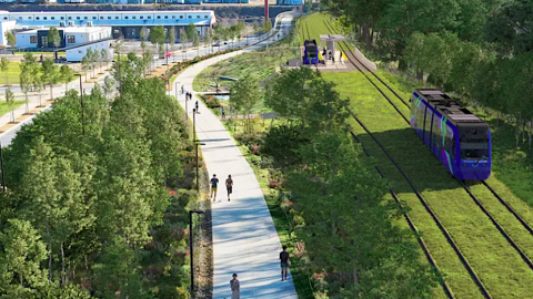 An image showing a possible route for light-rail transportation in Atlanta near a wide walking pathway under blue skies.