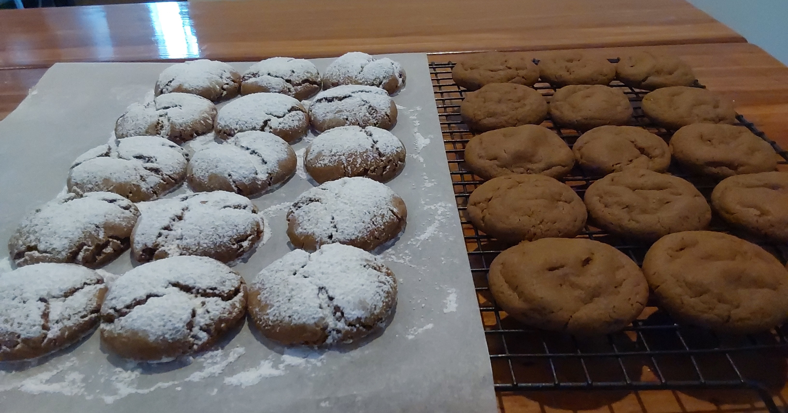 rack of biscuits, half dusted with icing sugar