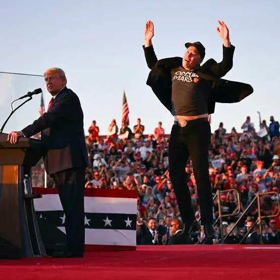 Apartheid manchild jumps on stage at a Trump rally