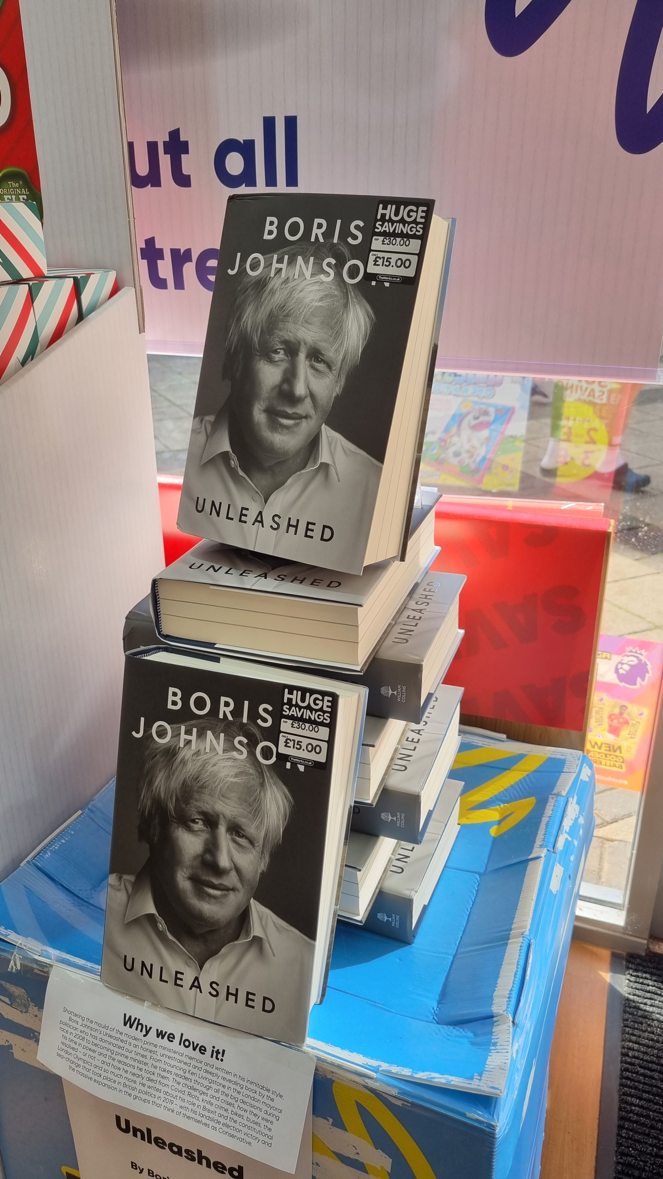 Boris Johnson's memoirs in a stack reduced from £30 to £15